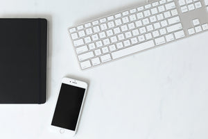 Mouse, phone and keyboard